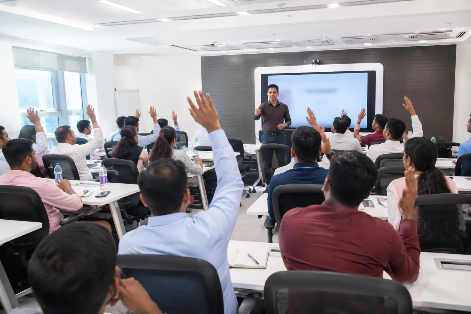 Business team in a hands-on enterprise AI adoption session